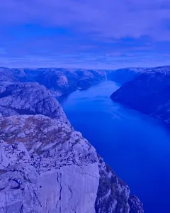 Sample photo of a fjord transformed with e_tint:45,co_blue